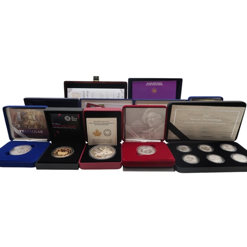 492B - Elizabeth II (1952-2022) a lot comprising various commemorative and proof  silver coins to... 