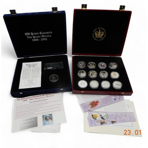 494F -  Elizabeth II (1952-2022) A lot comprising four cases of mostly silver commemorative coins... 