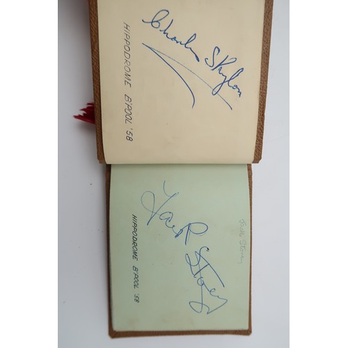 591 - AUTOGRAPHSA tartan bound autograph books containing signatures of early-1930s Scottish footballers, ... 