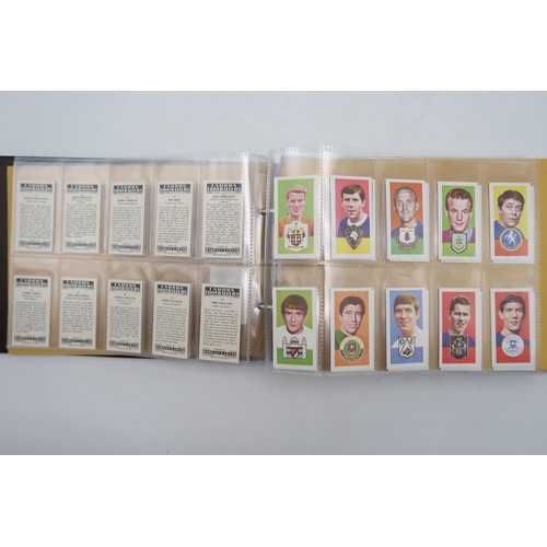 597 - A collection of 1960s and later football collectors cards and related ephemera, to include the Famou... 