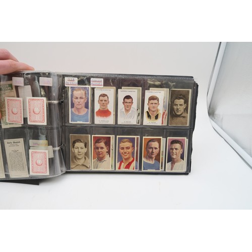 583 - Early-20th century football cigarette/collectors' cards, to include the Ogden's Tab Leading Athletes... 