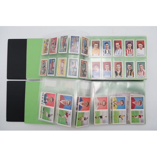 600 - Four albums of football cigarette/collectors' cards, comprising Gallagher Ltd.'s Footballers in Acti... 