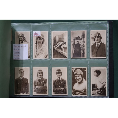 593 - A mixed collection of cigarette/collectors' cards, housed in folders, to include The Wills Portraits... 