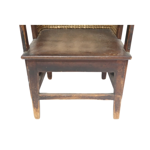 2006 - A 19TH CENTURY OAK FRAMED ORKNEY CHAIRwith curved rush back over plain seat flanked by carved scroll... 