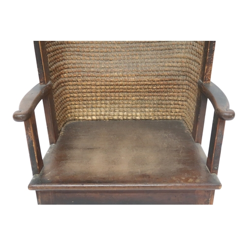 2006 - A 19TH CENTURY OAK FRAMED ORKNEY CHAIRwith curved rush back over plain seat flanked by carved scroll... 