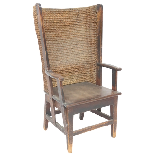 2006 - A 19TH CENTURY OAK FRAMED ORKNEY CHAIRwith curved rush back over plain seat flanked by carved scroll... 