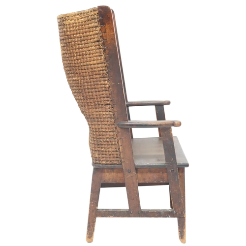 2006 - A 19TH CENTURY OAK FRAMED ORKNEY CHAIRwith curved rush back over plain seat flanked by carved scroll... 