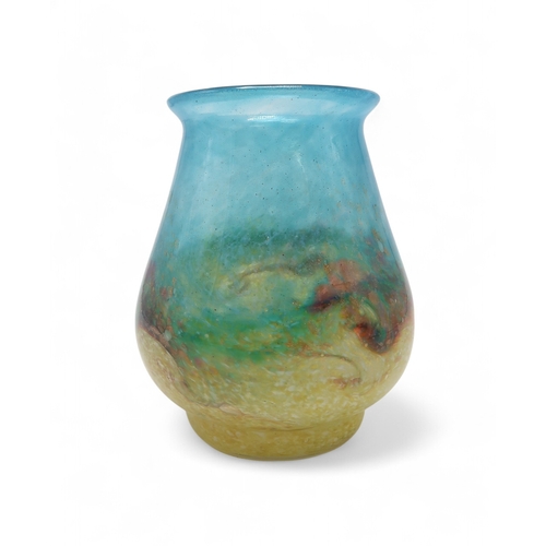 2152 - A MONART GLASS VASEwith swirling blue and yellow, with splashes of red and aventurine, shape RA VII,... 