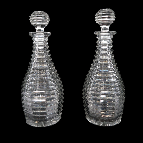 2158 - A PAIR OF 19TH CENTURY CUT GLASS DECANTERS25cm high