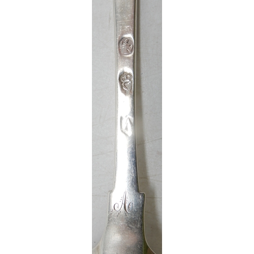 2357 - A COLLECTION OF FLATWAREincluding; a George III silver serving spoon, Edinburgh 1801, a Scottish pro... 