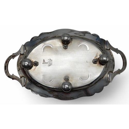 2362 - AN EDWARDIAN SILVER EGG CRUETby Walker & Hall, Sheffield 1910, the base shaped as a twin-handled... 