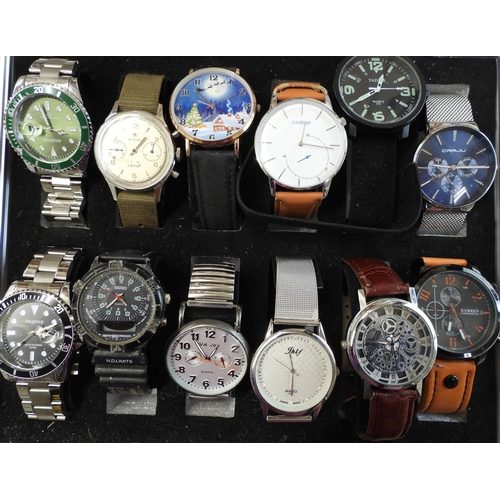 879 - A box of ten gents fashion watches, to include 21 Zuan, Ananke, Curren etc