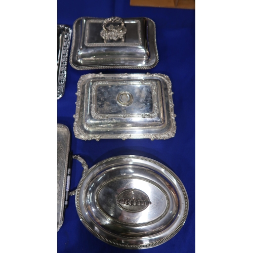 325 - A collection of EPNS including entree dishes, a set of silvered wooden trays, oval trays, salvers, s... 