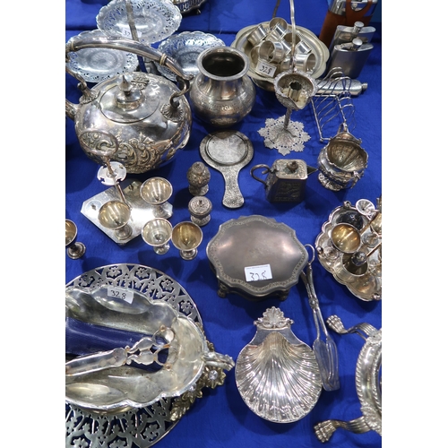 328 - A large collection of EPNS including a pair of bread baskets (af),  a ewer, a tea service, cruet set... 