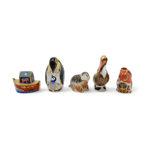 160 - Five Royal Crown Derby paperweights including penguin and chick, Riverbank Beaver, Brown Pelican, Re... 