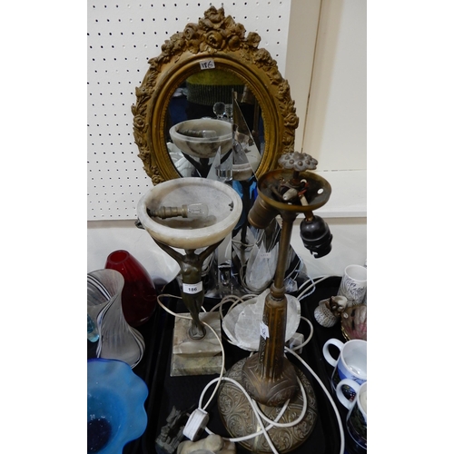 186 - An Art Deco spelter lady figure lamp, a chromed sailing ship lamp, a gesso mirror and a double bulb ... 