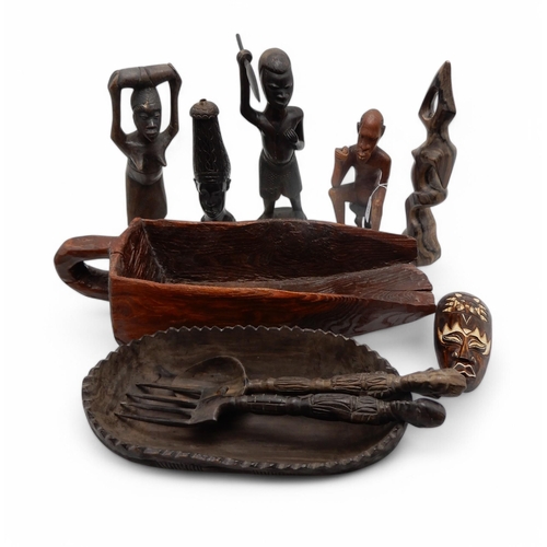 211 - A Nigerian wooden bowl, assorted figures etc