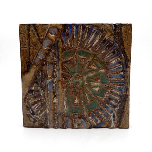 215 - A Portuguese glazed ceramic tile, with abstract design 