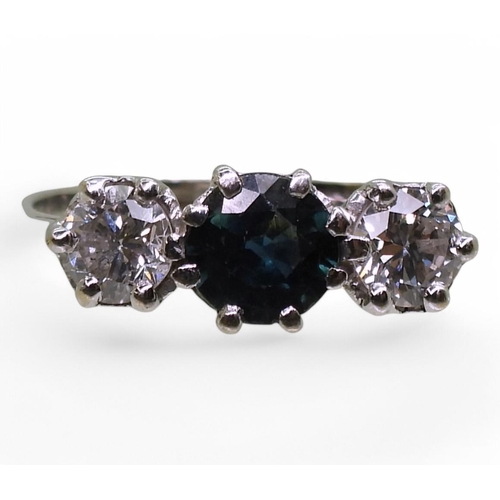 703 - A sapphire and diamond three stone diamond ring, mounted in white metal, estimated approx diamond ca... 