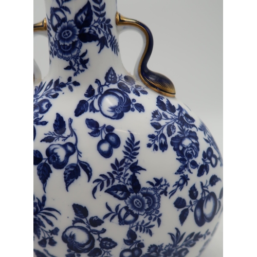 158 - A Royal Worcester moon flask, decorated with transfer printed fruits and flowers, blue crescent mark... 