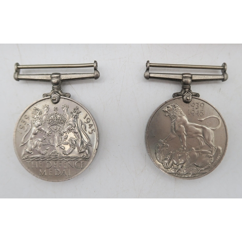 402 - A WW2 War Medal and Defence Medal, an Auxiliary Territorial Service cap badge engraved verso 