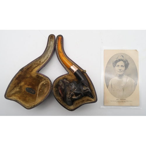 403 - A leather-cased 9ct gold-collared amber-handled Meerschaum pipe, with bowl modelled as an Edwardian ... 