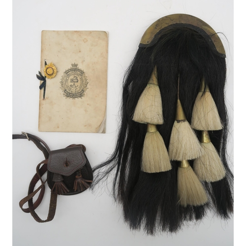 406 - An early-20th century Argyll & Sutherland Highlanders horsehair sporran, black, suspending six w... 