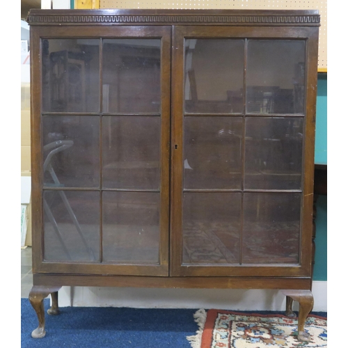 106 - An early 20th century mahogany glazed bookcase on cabriole supports, 123cm high x 106cm wide x 29cm ... 