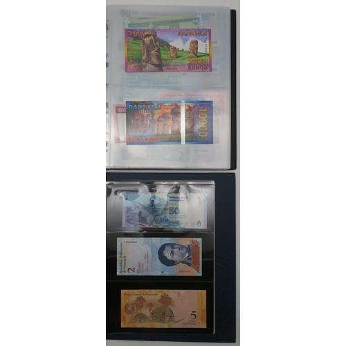 364 - A world wide collection of banknotes in three albums together with A Falklands Islands £5 1983... 