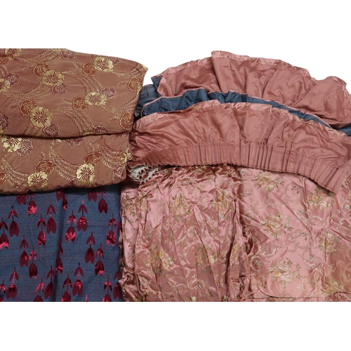 6016 - A collection of floral curtains, mainly in pinks and reds