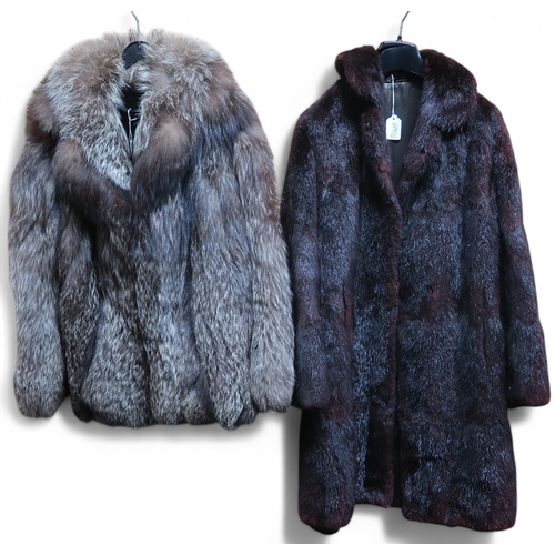 6095 - A fox fur coat and a mid length fur coat