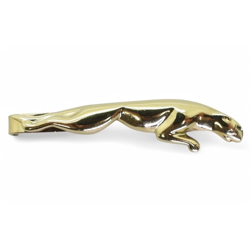 701 - A 9ct gold Jaguar car logo tie slide, length 4.3cm,  weight 4.4gms