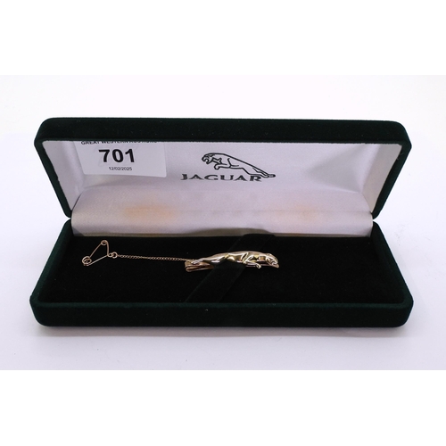 701 - A 9ct gold Jaguar car logo tie slide, length 4.3cm,  weight 4.4gms