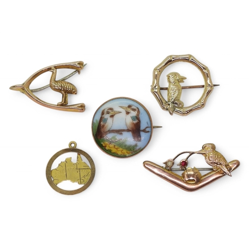 704 - A collection of Australian 9ct gold jewellery to include;- three Kookaburra brooches, one with a por... 