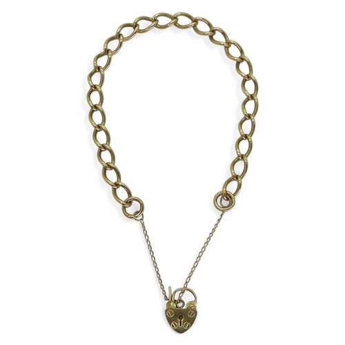 717 - A 9ct gold curb chain bracelet with heart shaped clasp, length 18cm, weight 12.3gms