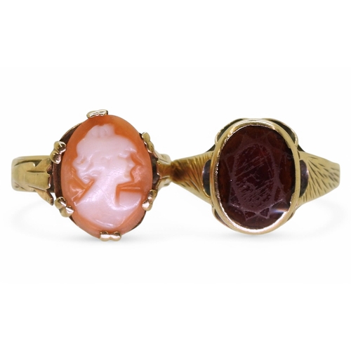 747 - Two 9ct gold rings, a cameo size L1/2 (approx) and a garnet size S1/2, weight combined 5.5gms