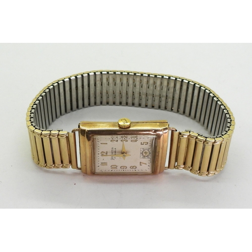 757 - A 9ct gold gents Helvetia watch hallmarked 1959, with a gold plated strap, weight with movement and ... 