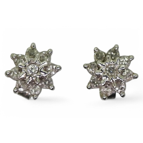 764 - A pair of 9ct gold diamond set snowflake earrings, weight 1.7gms