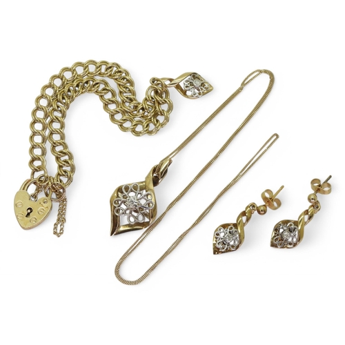 766 - A suite of 9ct gold diamond set flower jewellery comprising of a pair of earrings, a pendant and a c... 