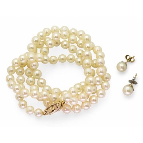 780 - A string of 62cm cultured pearls with a 9ct gold clasp, together with a pair of 9ct gold pearl stud ... 