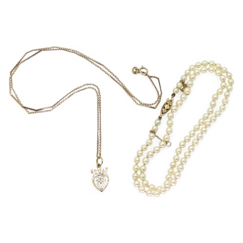 782 - A 42cm long string of cultured pearls with a 9ct gold clasp, together with a 9ct gold luckenbooth pe... 