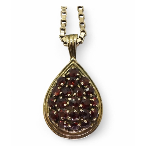 783 - A 54cm 9ct gold box chain with a 9ct gold garnet cluster pendant, weight together 10.4gms