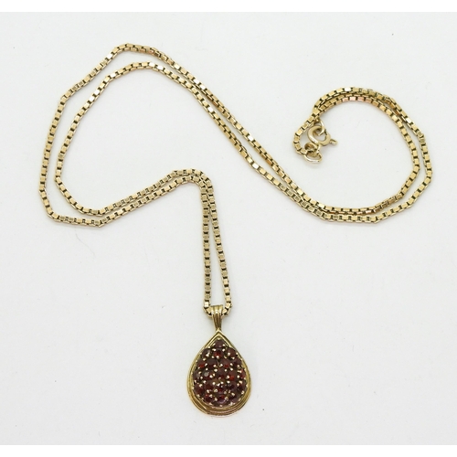 783 - A 54cm 9ct gold box chain with a 9ct gold garnet cluster pendant, weight together 10.4gms