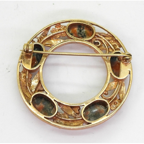 797 - A 9ct rose gold brooch made by Sydney & Co, set with moss agates, diameter 4.1cm, weight 14.2gms