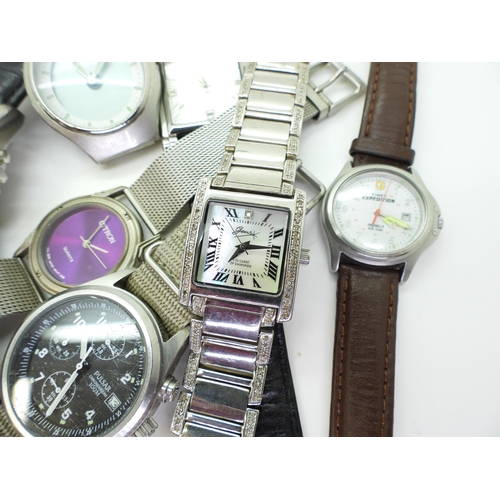 861 - A collection of fashion watches to include;- A silver GemsTV diamond set watch, a citizen Eco Drive,... 