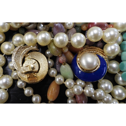 874 - A large collection of vintage costume jewellery to include;- a string of tiger's eye beads, a string... 