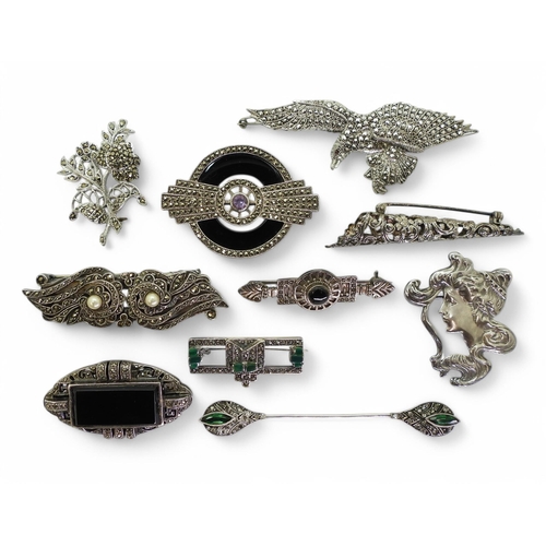 896 - Collection of marcasite brooches, set in silver and white metal, including an eagle brooch marked F.... 