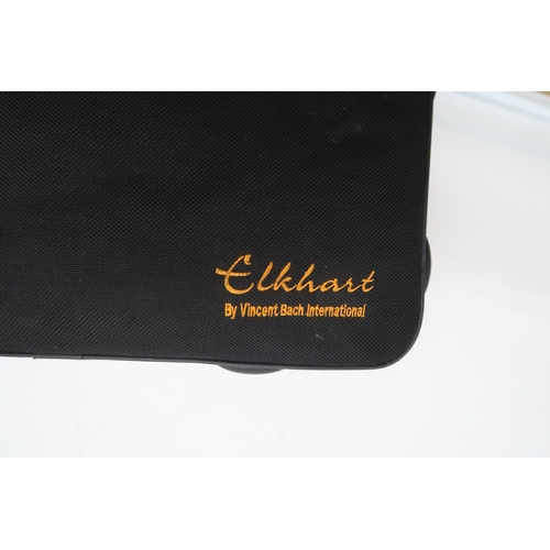 392 - An Elkhart by Vincent Bach International brass cornet, AD 20508082, in fitted carrying case.