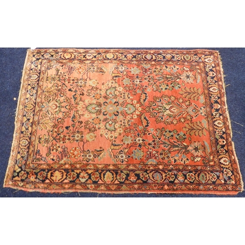 105 - A lot comprising a multicoloured ground Tabriz rug with sun burst central medallion and dark blue sp... 