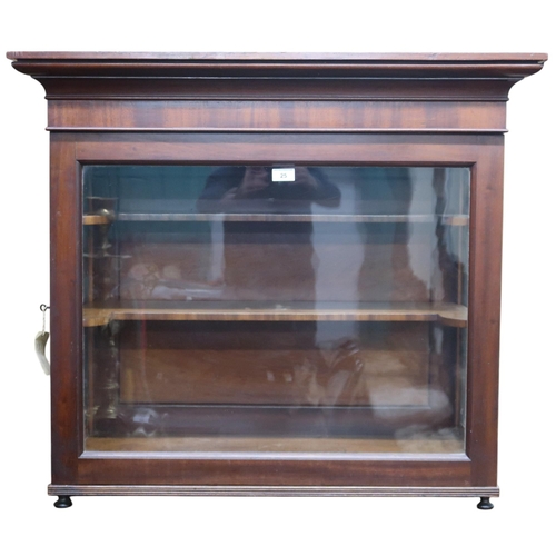 25 - A 19th century mahogany countertop display cabinet with moulded cornice over single glazed door and ... 